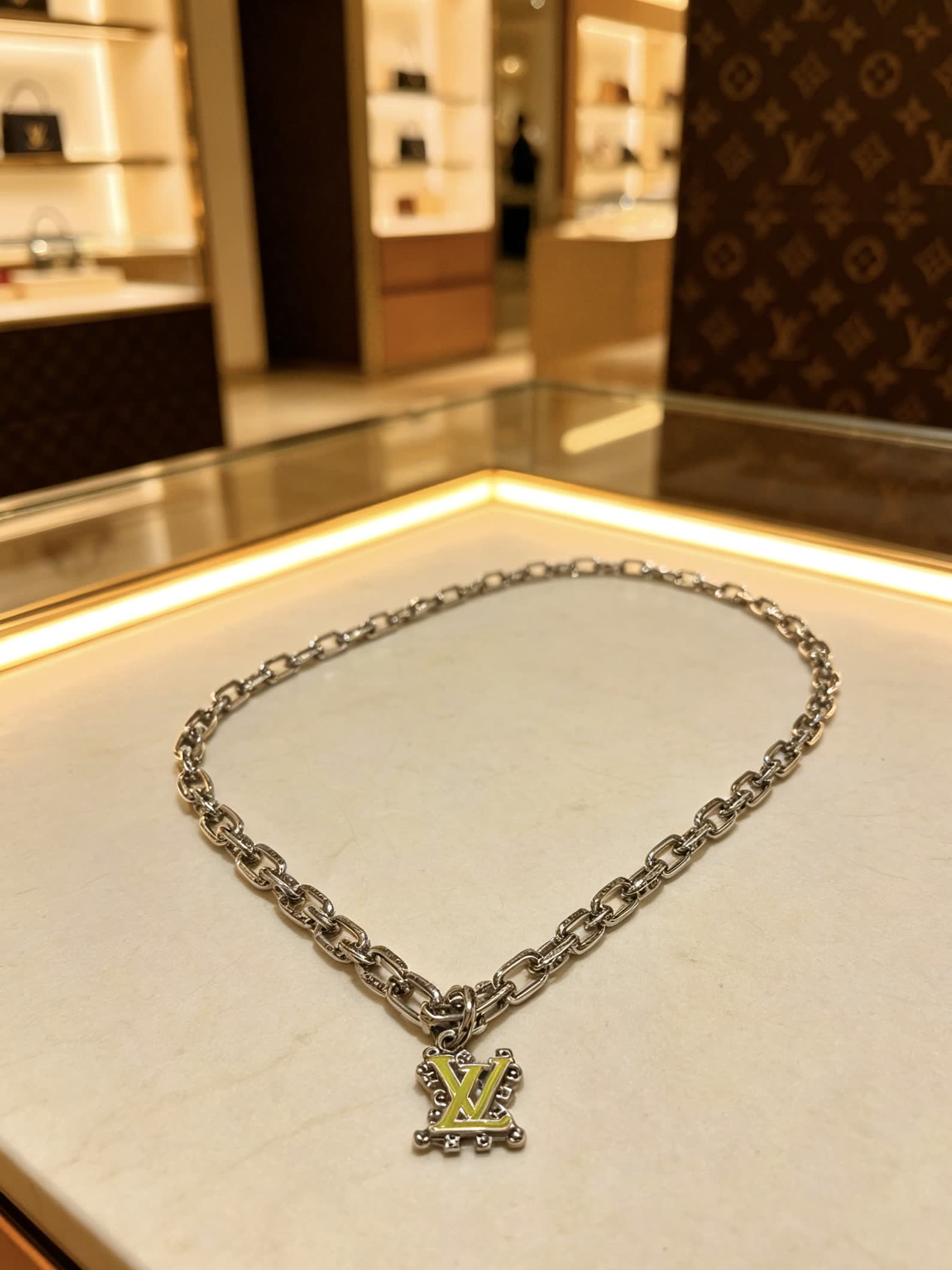 Louis Vuitton Silver Chain with LV Pendant